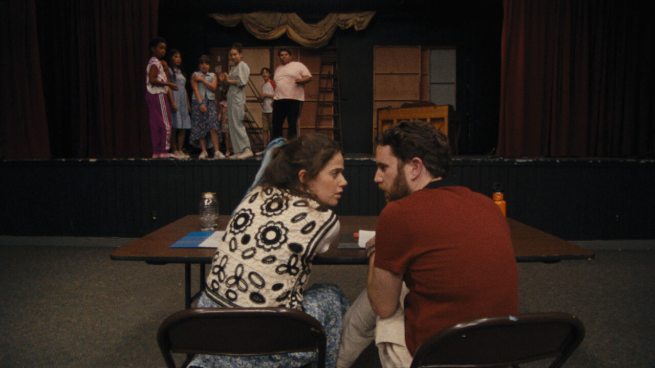 Molly Gordon and Ben Platt, Alexander Bello, Kyndra Sanchez, Bailee Bonick, Quinn Titcomb, Madisen Marie Lora, Donovan Colan and Luke Islam appear in a still from Theater Camp by Molly Goron and Nick Lieberman, an official selection of the U.S. Dramatic Competition at the 2023 Sundance Film Festival. Courtesy of Sundance Institute
