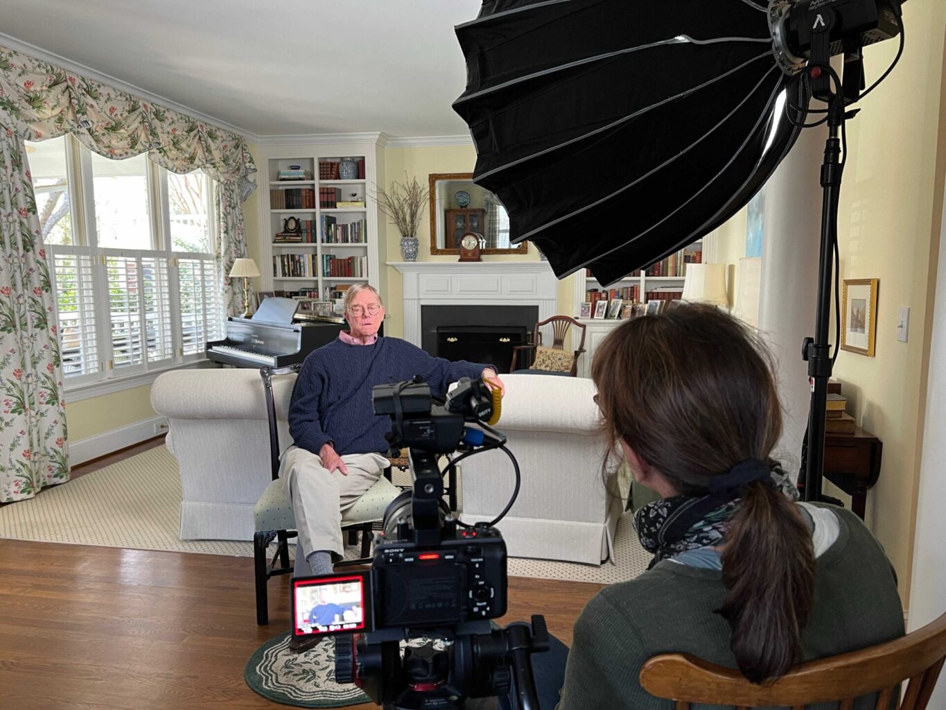 "De was more than willing to stay open and honest in pursuing the truth of his slaveholding roots. There were no rose-colored glasses." Pictured: Louise Whoerle interviews Jock Tonissen in the documentary A BINDING TRUTH. Photo courtesy of Whirlygig Productions.