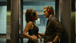 Adria Arjona and Glen Powell in 'Hit Man,' a film by Richard Linklater. Photo courtesy of Netflix